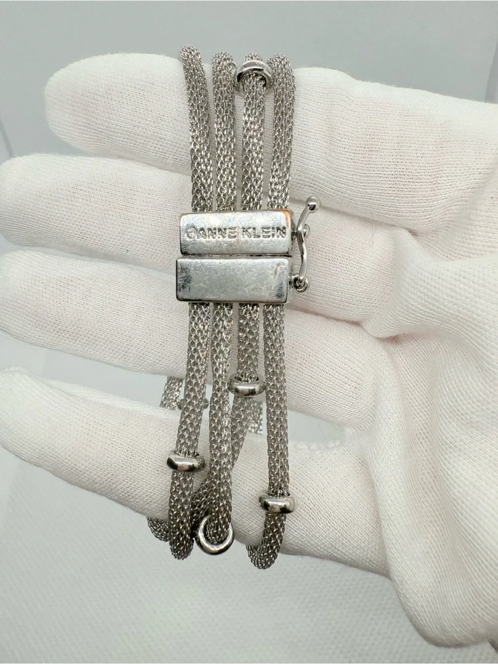 Anne Klein Silver Layered Mesh Bracelet with Polished Rings
